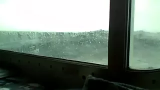 Big wave hits cabin window