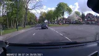Speeding driver doesn't see the camera van