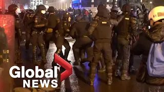 Protesters clash with French police in Paris over security bill