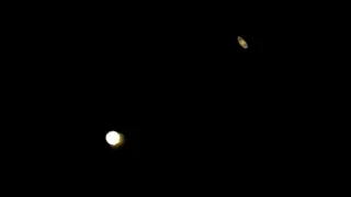 Jupiter and Saturn's Great Conjunction through 70mm telescope.