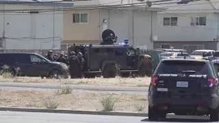 Standoff underway for suspected carjacker accused of shooting a Stockton police sergeant