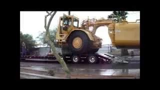 Truck Works Inc Manufactured 8000 gallon CAT Water PUll Loading Up