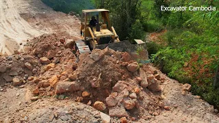 Heavy Bulldozer Spreading Soil Stone Making Foundation Road Construction & 5TON Truck Pouring Stone