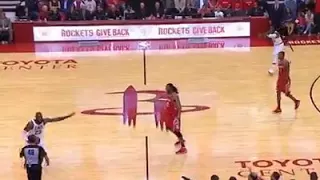 Lebron gets a turn over and refuses to give the ball up to Trevor Ariza but does and makes him pay