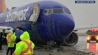 Southwest flight skids off end of runway at Burbank Airport | ABC7