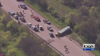 2 dead, more than 40 people involved in school bus rollover crash, officials say