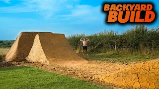 WE BUILT THE BIGGEST BACKYARD DIRT JUMP FOR HUGE TRICKS!!