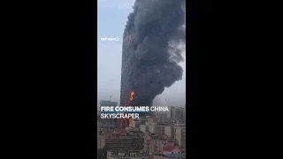 Massive fire engulfs high-rise tower in China