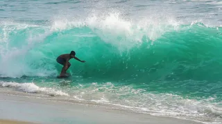 Professional Skimboarding Huge Waves On the Beach