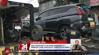 Mga sasakyan at iba pang nakabara sa Mabuhay Lane, hinatak at tiniketan ng MMDA | 24 Oras