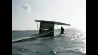 Righting a capsized catamaran (Hobie Cat speed)