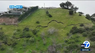 Giant crack forms in ground on hillside in Brentwood neighborhood