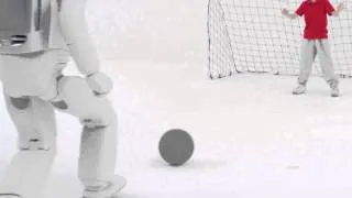 All New ASIMO Kicking Football