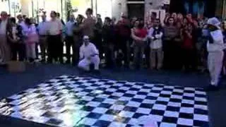 New Orleans Breakdancer slides on his head!