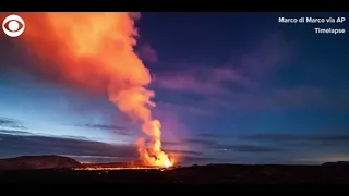 Northern Lights captured over erupting volcano in timelapse video