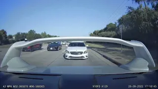 Distracted driver causes 4 car accident.