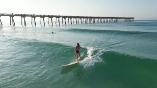 $terling $pencer surfs crystal drain pipes in Pensacola Beach