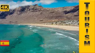 Playa de Famara Beach (Lanzarote, Canary Islands) - Drone footage - Bird's eye view - 4K