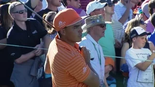 Rickie Fowler gets lucky off the tee on No. 18 at Waste Management