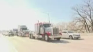 Truck convoy rolls into DC with horns blaring