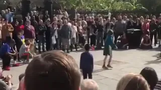 11 year old kid surprises street performers with a Backflip!!!