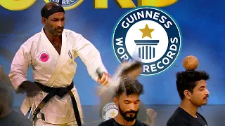 Cracking Coconuts On Heads With Nunchucks - Guinness World Records