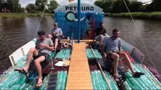 Crazy guys, made boat of empty plastic bottles.