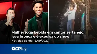 Mulher joga bebida em cantor sertanejo, leva bronca e é expulsa do show