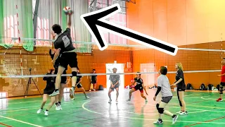 (Volleyball game) Ace jumps very lightly and high.