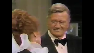 Maureen O'Hara serenades John Wayne