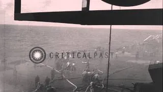 Fire fighting aboard the USS Hancock (CV-19) in the Pacific after explosion of TB...HD Stock Footage