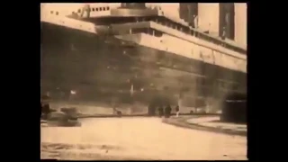 RMS Titanic Archive Footage Entering Harland & Wolf Shipyard Dock - Belfast Ireland 1912