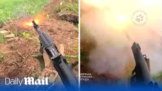 Intense POV footage of Ukrainian soldiers capturing Russian position in trench warfare