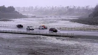 Rain from Tropical Storm Hilary lashes California, swamping roads and trapping cars