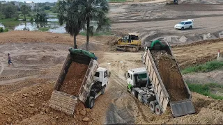 Action Excellent Duble Bulldozer Collaborate to new road sand filling Dump truck.