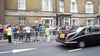 The bridesmaid leaving the Goring Hotel