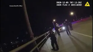 Video shows deputies save man from jumping off a bridge