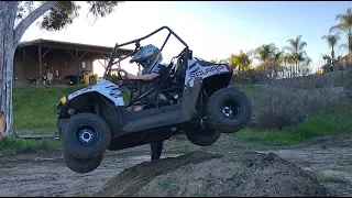 8 YEAR OLD DRIVING A RZR!!!