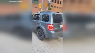 WATCH: Video of car driving on sidewalk in downtown Toronto
