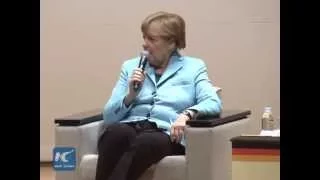 Merkel tells Japan to look squarely at history