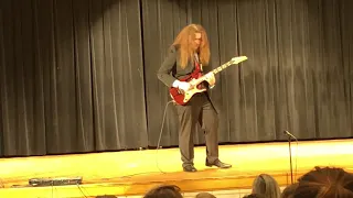 Playing Yngwie Malmsteen at my high school talent show ( I won )