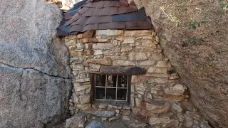 Gold Mine and A Cabin Built Into Boulders