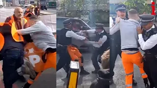 Just Stop Oil: Motorist handcuffed by police after appearing to shove a protester