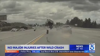 Car launched into air by runaway tire