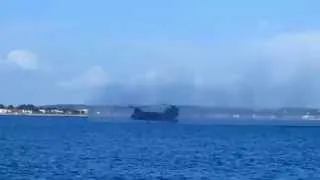 SBS (Special Boat Service) launching a rib from a chinook in Poole bay