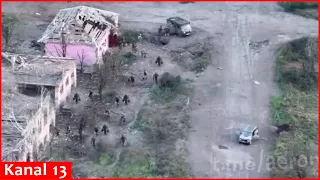 The moment Russian soldiers carrying food and ammunition to their hiding place are targeted