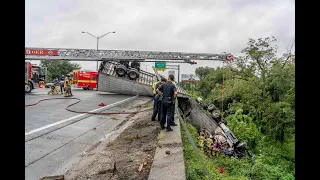 Jacksonville Fire Rescue Department responds to a semi flipped over the side of an embankment