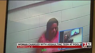 Woman charged with assaulting teen at pool