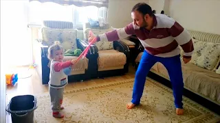 Baby fighting with his father