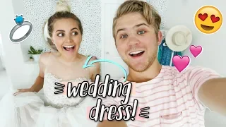 TRYING ON MY WEDDING DRESS 3 YEARS LATER! & Husband's Reaction!!